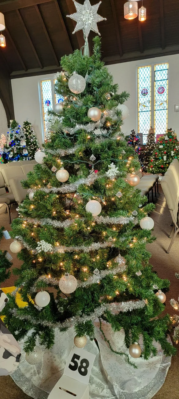 A decorated Christmas tree at a past Festival of Trees